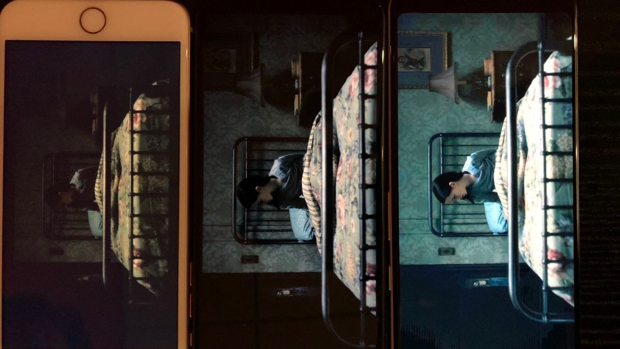 A scene from 'The Haunting of Hill House' as rendered on (from L to R) iPhone 8 Plus, iPhone XS Max and Pixel 3 XL. 